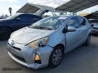 2013 Toyota Prius c One with VIN JTDKDTB32D1540164, listed as a IAAI auction lot 41973337 with 282,033 mi miles. Bid and sale history available at carsss.com. Image 17.