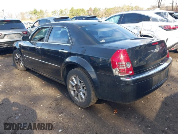 2009 Chrysler 300 Limited with VIN 2C3KA33V59H570460, listed as a IAAI auction lot 42017573 with 130,600 mi miles. Bid and sale history available at carsss.com. Image 3.