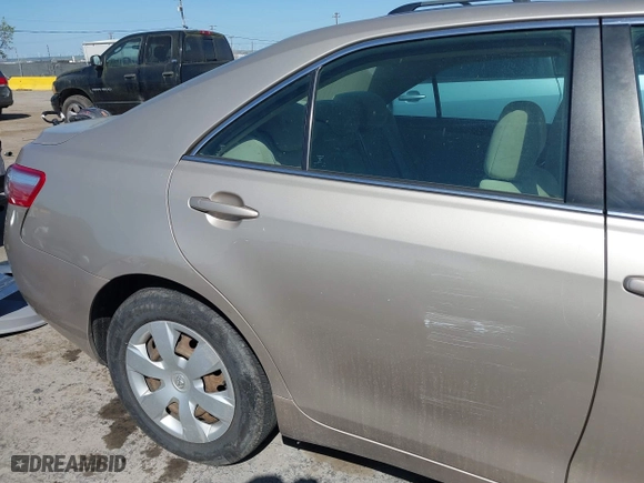 2007 Toyota Camry CE with VIN 4T1BE46K97U180782, listed as a IAAI auction lot 42046103 with 171,607 mi miles. Bid and sale history available at carsss.com. Image 12.