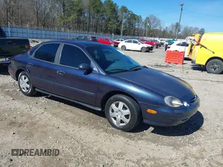 1998 Ford Taurus LX z VIN 1FAFP52U0WA226924, wystawiony jako IAAI lot #41702083 z przebiegiem 55 998 mil mil oraz . Historia ofert i sprzedaży dostępna na DreamBid. Obrazek 1.