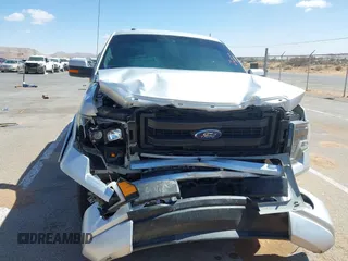 2014 Ford F-150 XL with VIN 1FTFW1CF2EKF90227, listed as a IAAI auction lot 41762047 with 106,927 mi miles. Bid and sale history available at carsss.com. Image 12.