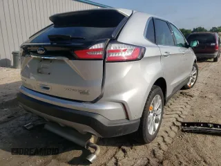2019 Ford Edge Titanium z VIN 2FMPK3K9XKBB42665, wystawiony jako Copart lot #48865052 z przebiegiem 59 332 mil mil oraz Nie do naprawy • Non repairable. Historia ofert i sprzedaży dostępna na DreamBid. Obrazek 4.