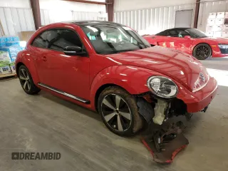 2012 Volkswagen Beetle 2.0T Turbo w/Sun/Snd/Nav PZEV with VIN 3VWVA7AT9CM614435, listed as a Copart auction lot 87645395 with 0 mi miles and Salvage Title. Bid and sale history available at carsss.com. Image 4.