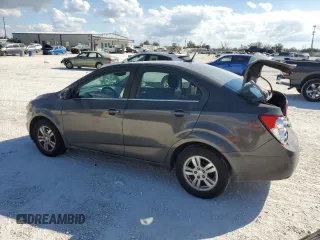 2013 Chevrolet Sonic LT with VIN 1G1JC5SHXD4198167, listed as a Copart auction lot 44758085 with 103,449 mi miles and Salvage Title. Bid and sale history available at DreamBid. Image 2.