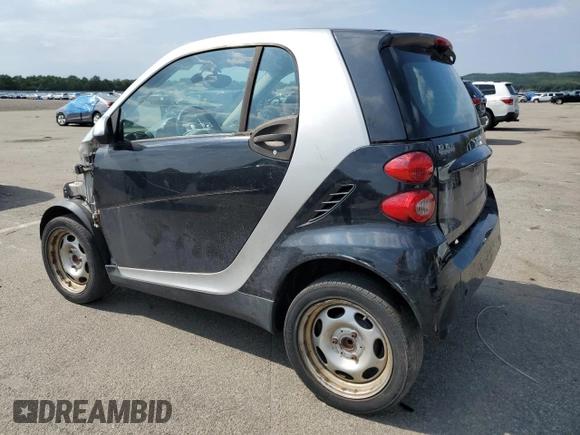 2008 Smart fortwo Pure z VIN WMEEJ31X78K205574, wystawiony jako Copart lot #67711894 z przebiegiem Nie podano mil oraz Tytuł czysty. Historia ofert i sprzedaży dostępna na DreamBid. Obrazek 2.