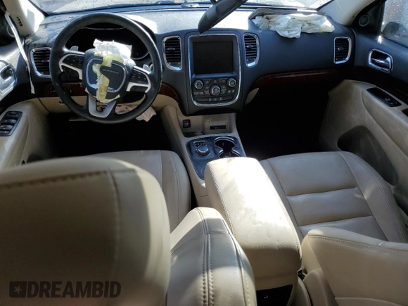 2014 Dodge Durango Limited с VIN 1C4SDJDT2EC358987, выставлен на аукционе Copart как лот 48870855 с пробегом 157 246 миль миль и Списание • Salvage title. История ставок и продаж доступна на DreamBid. Изображение 8.