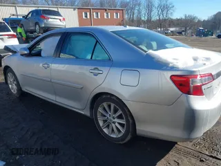 2014 Toyota Camry SE with VIN 4T1BK1FK6EU548176, listed as a IAAI auction lot 41392975 with 143,249 mi miles. Bid and sale history available at carsss.com. Image 14.