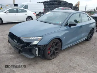 2023 Audi RS 3 with VIN WUAG4DGY9PA905303, listed as a IAAI auction lot 41728962 with 16,896 mi miles. Bid and sale history available at carsss.com. Image 2.