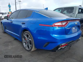 2018 Kia Stinger GT with VIN KNAE35LC5J6010230, listed as a IAAI auction lot 41924415 with 123,572 mi miles. Bid and sale history available at carsss.com. Image 3.