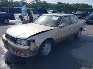 1991 Lexus LS z VIN JT8UF11E6M0097547, wystawiony jako IAAI lot #42224368 z przebiegiem 118 474 mil mil oraz . Historia ofert i sprzedaży dostępna na DreamBid. Obrazek 2.