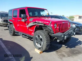 2011 Jeep Wrangler Unlimited Rubicon with VIN 1J4BA6H17BL615730, listed as a IAAI auction lot 42272164 with 179,789 mi miles and . Bid and sale history available at DreamBid. Image 1.