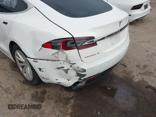 2016 Tesla Model S 70 with VIN 5YJSA1E12GF172359, listed as a IAAI auction lot 42107587 with Not provided miles and . Bid and sale history available at DreamBid. Image 6.