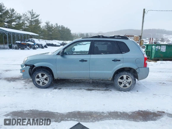 2006 Hyundai Tucson GL with VIN KM8JM72B06U298904, listed as a IAAI auction lot 41370728 with 209,284 mi miles. Bid and sale history available at carsss.com. Image 14.