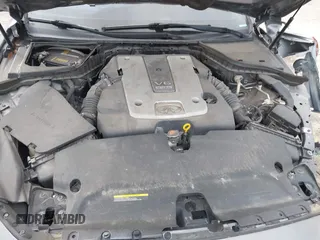 2015 Infiniti Q50 Premium with VIN JN1BV7AP5FM336231, listed as a IAAI auction lot 41654477 with 119,535 mi miles. Bid and sale history available at carsss.com. Image 10.