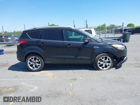 2015 Ford Escape Titanium с VIN 1FMCU0JX5FUB87813, выставлен на аукционе IAAI как лот 42035295 с пробегом 148 430 миль миль и . История ставок и продаж доступна на DreamBid. Изображение 13.