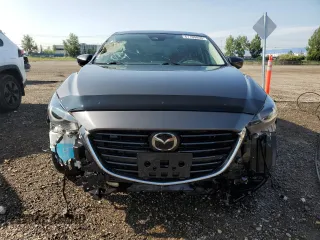 2018 Mazda 3 Grand Touring z VIN 3MZBN1W36JM225021, wystawiony jako Copart lot #61100855 z przebiegiem 155 817 mil mil oraz Czysty tytuł • Clean title. Historia ofert i sprzedaży dostępna na DreamBid. Obrazek 5.