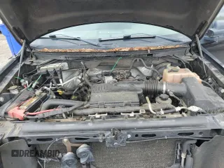 2010 Ford F-150 XL with VIN 1FTMF1CW1AKC09582, listed as a Copart auction lot 54296315 with 127,439 mi miles and Salvage title. Bid and sale history available at DreamBid. Image 11.
