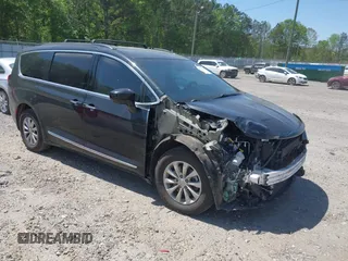 2017 Chrysler Pacifica Touring L with VIN 2C4RC1BG7HR539716, listed as a IAAI auction lot 42037822 with 160,623 mi miles and . Bid and sale history available at DreamBid. Image 1.