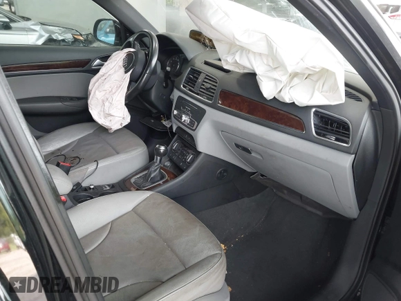 2017 Audi Q3 Premium Plus with VIN WA1HCCFS1HR013054, listed as a IAAI auction lot 42359261 with 148,435 mi miles and . Bid and sale history available at DreamBid. Image 5.