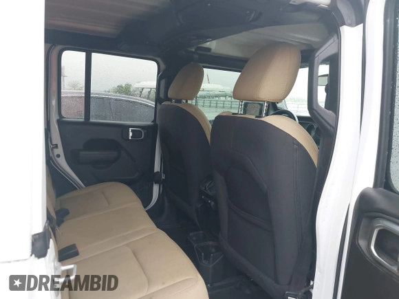 2023 Jeep Wrangler Sport with VIN 1C4HJXDN8PW523532, listed as a IAAI auction lot 41962483 with 14,643 mi miles and . Bid and sale history available at DreamBid. Image 8.