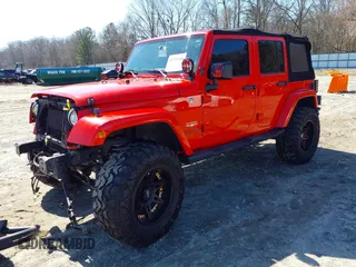 2015 Jeep Wrangler Unlimited Sahara with VIN 1C4BJWEG1FL748732, listed as a IAAI auction lot 41779308 with 109,986 mi miles. Bid and sale history available at carsss.com. Image 2.