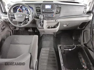 2023 Ford Transit Cargo with VIN 1FTBR1Y86PKB40356, listed as a Copart auction lot 45669345 with 12,890 mi miles and Salvage Title. Bid and sale history available at DreamBid. Image 8.