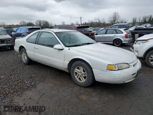 1997 Ford Thunderbird LX z VIN 1FALP62W2VH154138, wystawiony jako Copart lot #46281235 z przebiegiem 145 738 mil mil oraz Tytuł czysty. Historia ofert i sprzedaży dostępna na DreamBid. Obrazek 4.
