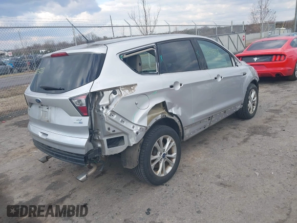 2017 Ford Escape SE z VIN 1FMCU9GDXHUA46689, wystawiony jako IAAI lot #41492523 z przebiegiem 67 401 mil mil oraz . Historia ofert i sprzedaży dostępna na DreamBid. Obrazek 4.