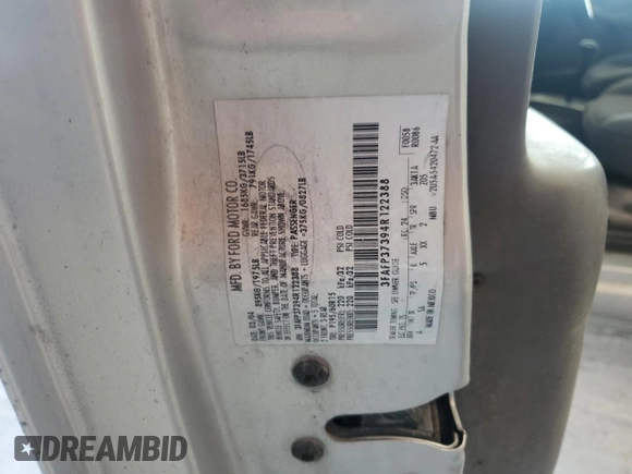 2004 Ford Focus ZX5 z VIN 3FAFP37394R122388, wystawiony jako Copart lot #45163225 z przebiegiem 259 554 mil mil oraz Czysty tytuł • Clean title. Historia ofert i sprzedaży dostępna na DreamBid. Obrazek 12.