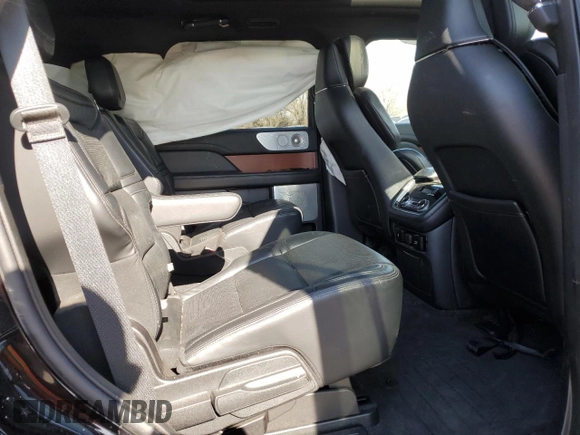 2020 Lincoln Navigator Reserve z VIN 5LMJJ2LT2LEL09441, wystawiony jako Copart lot #50593575 z przebiegiem 59 347 mil mil oraz Szkoda całkowita • Salvage title. Historia ofert i sprzedaży dostępna na DreamBid. Obrazek 11.
