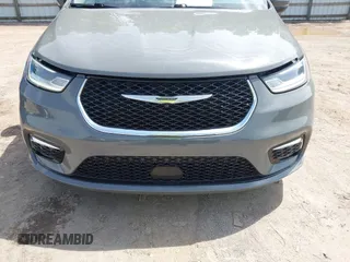 2023 Chrysler Pacifica Hybrid Touring L with VIN 2C4RC1L73PR522988, listed as a IAAI auction lot 42280263 with 54,939 mi miles and . Bid and sale history available at DreamBid. Image 12.