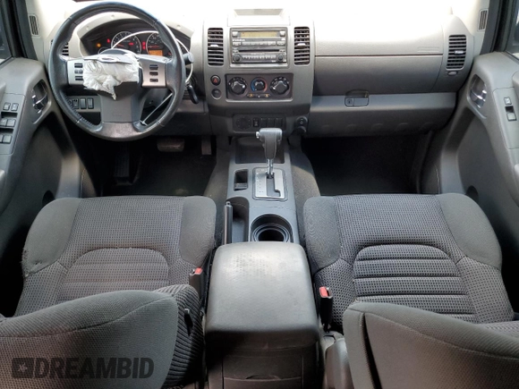 2008 Nissan Frontier SE with VIN 1N6AD07UX8C406795, listed as a Copart auction lot 61303185 with 145,742 mi miles and Salvage title. Bid and sale history available at DreamBid. Image 8.