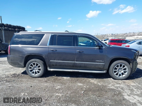 2015 GMC Yukon XL Denali with VIN 1GKS2JKJ5FR144991, listed as a IAAI auction lot 41877853 with 167,814 mi miles. Bid and sale history available at carsss.com. Image 14.