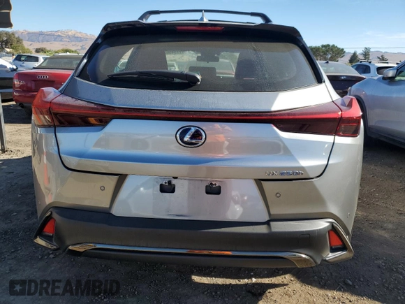 2022 Lexus UX 250h F Sport with VIN JTHE9JBH2N2062143, listed as a Copart auction lot 77345634 with 13,118 mi miles and Salvage Title. Bid and sale history available at DreamBid. Image 6.
