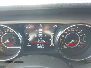 2021 Jeep Wrangler Sport S with VIN 1C4HJXAG6MW744998, listed as a IAAI auction lot 42170965 with 59,373 mi miles and . Bid and sale history available at DreamBid. Image 7.