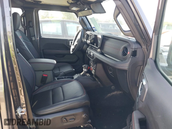 2025 Jeep Wrangler Rubicon with VIN 1C4PJXFNXSW532895, listed as a IAAI auction lot 42694548 with 1,886 mi miles and . Bid and sale history available at DreamBid. Image 5.