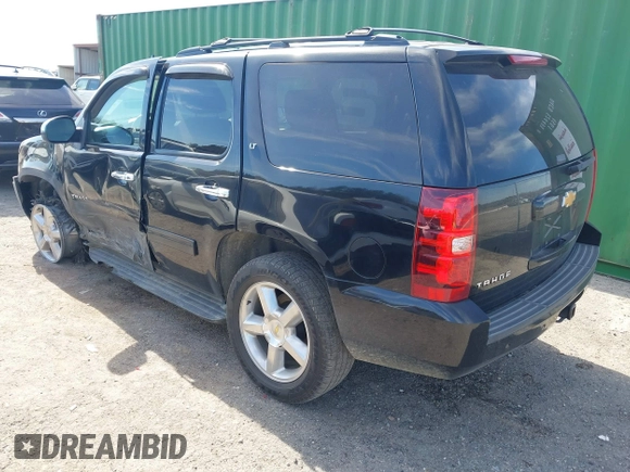 2014 Chevrolet Tahoe LT z VIN 1GNSCBE02ER181908, wystawiony jako IAAI lot #41628601 z przebiegiem 189 151 mil mil oraz . Historia ofert i sprzedaży dostępna na DreamBid. Obrazek 3.
