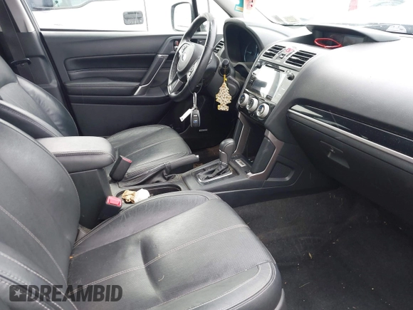 2018 Subaru Forester Touring with VIN JF2SJAWC6JH496875, listed as a IAAI auction lot 42347532 with 70,978 mi miles and . Bid and sale history available at DreamBid. Image 5.