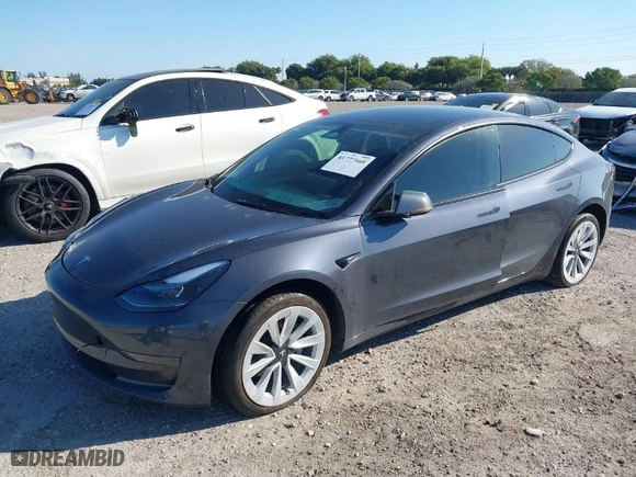 2023 Tesla Model 3 with VIN 5YJ3E1EA2PF642253, listed as a IAAI auction lot 41777160 with 29,817 mi miles. Bid and sale history available at carsss.com. Image 2.