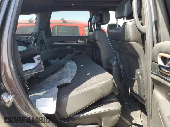 2017 Jeep Grand Cherokee Overland with VIN 1C4RJFCGXHC941983, listed as a Copart auction lot 52008825 with 65,776 mi miles and Salvage Title. Bid and sale history available at carsss.com. Image 10.