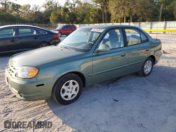 2005 Hyundai Accent GLS with VIN KMHCG45C35U595666, listed as a Copart auction lot 88294365 with 70,497 mi miles and Salvage Title. Bid and sale history available at carsss.com. Image 1.