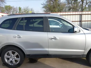 2009 Hyundai Santa Fe SE with VIN 5NMSH13E99H300552, listed as a IAAI auction lot 41772584 with 155,127 mi miles. Bid and sale history available at carsss.com. Image 14.