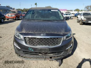 2021 Kia Sedona EX with VIN KNDMB5C11M6673086, listed as a Copart auction lot 42244935 with 57,698 mi miles and Salvage Title. Bid and sale history available at carsss.com. Image 5.