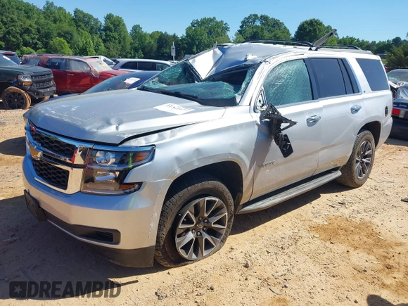 2020 Chevrolet Tahoe LT with VIN 1GNSKBKC5LR121085, listed as a IAAI auction lot 42341677 with 123,579 mi miles and . Bid and sale history available at DreamBid. Image 17.