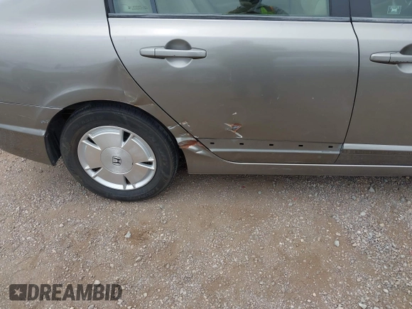 2006 Honda Civic z VIN JHMFA36286S006836, wystawiony jako IAAI lot #42324244 z przebiegiem 217 417 mil mil oraz . Historia ofert i sprzedaży dostępna na DreamBid. Obrazek 17.