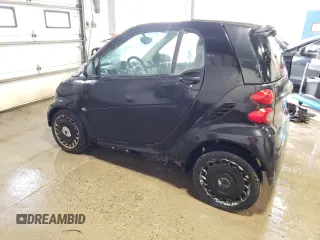 2009 Smart fortwo Pure with VIN WMEEJ31X99K280598, listed as a Copart auction lot 57480915 with 30,628 mi miles and Clean title. Bid and sale history available at DreamBid. Image 2.