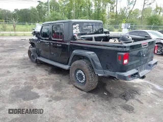 2021 Jeep Gladiator Sport S with VIN 1C6JJTAM3ML546307, listed as a IAAI auction lot 42635138 with Not provided miles and . Bid and sale history available at DreamBid. Image 3.