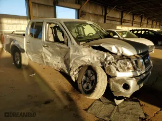2009 Nissan Frontier SE with VIN 1N6AD07U49C405644, listed as a Copart auction lot 44342525 with 212,826 mi miles and Salvage Title. Bid and sale history available at carsss.com. Image 4.