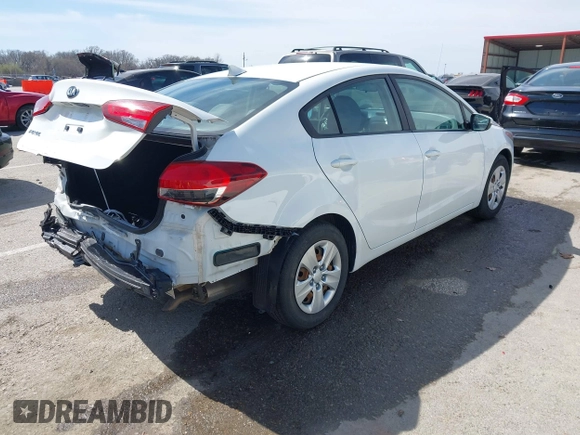 2018 Kia Forte LX with VIN 3KPFK4A77JE245278, listed as a IAAI auction lot 41797240 with 90,640 mi miles. Bid and sale history available at carsss.com. Image 4.