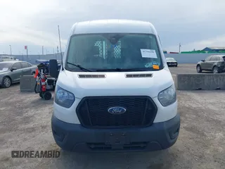 2021 Ford Transit Cargo with VIN 1FTBR1C89MKA03687, listed as a IAAI auction lot 41791299 with 116,341 mi miles and . Bid and sale history available at DreamBid. Image 11.